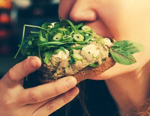 woman eating veggie burger