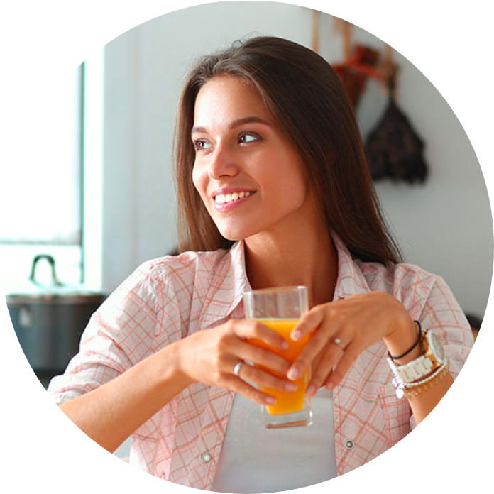 happy woman drinking healthy juice