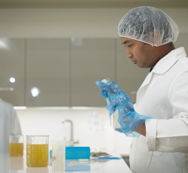 man working in food science beverage lab